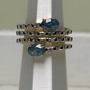 London Blue Topaz with Diamond Cubic Zirconia accents on Gold.  Size 9.